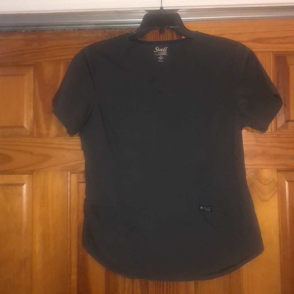 Grey V-neck scrub top with pockets